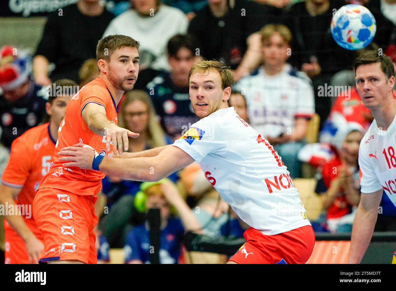 Sotra 20231105.The Netherlands' Luc Steins against Denmark's Mathias Gidsel and Hans Lindberg during the handball match in the Golden League Gjensidige Cup between the Netherlands and Denmark in the Sotra Arena. Photo: Stian Lysberg Solum / NTB Stock Photo