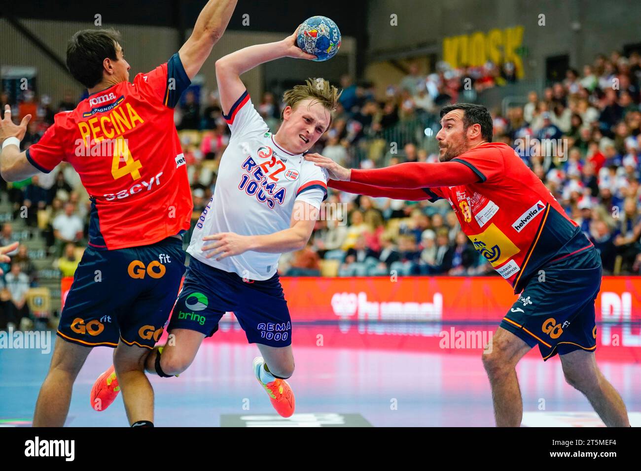 Sotra 20231105.Norway´s Tobias Schjoelberg Groendahl against Spain's Ignacio Peciña Tomé and Gedeón Guardiola Villaplana during the handball match in the Golden League Gjensidige Cup between Norway and Spain in the Sotra Arena. Photo: Stian Lysberg Solum / NTB Stock Photo