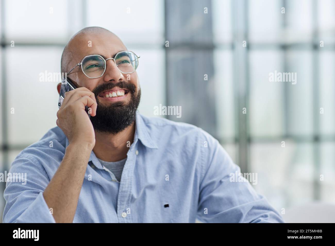 Businessman working on the table with laptop in a new office Stock Photo