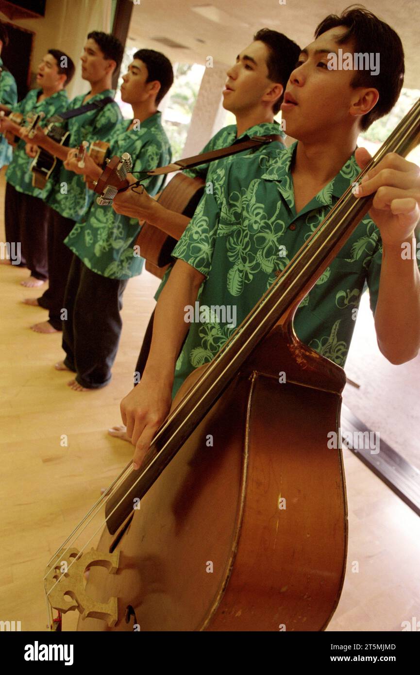 Bass guitars and ukuleles keep the beat Stock Photo Alamy