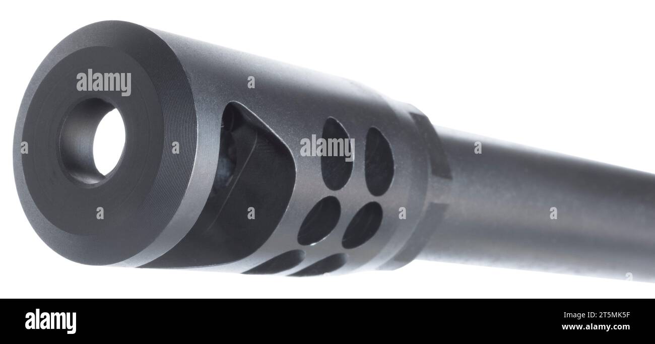 Quartering view of a high powered rifle muzzle brake with a number of