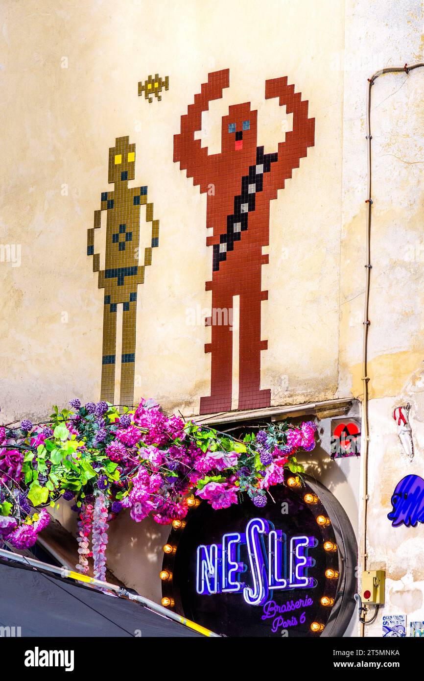 Tiled mural of figures above the Brasserie Nesle, Paris 6, France. Stock Photo