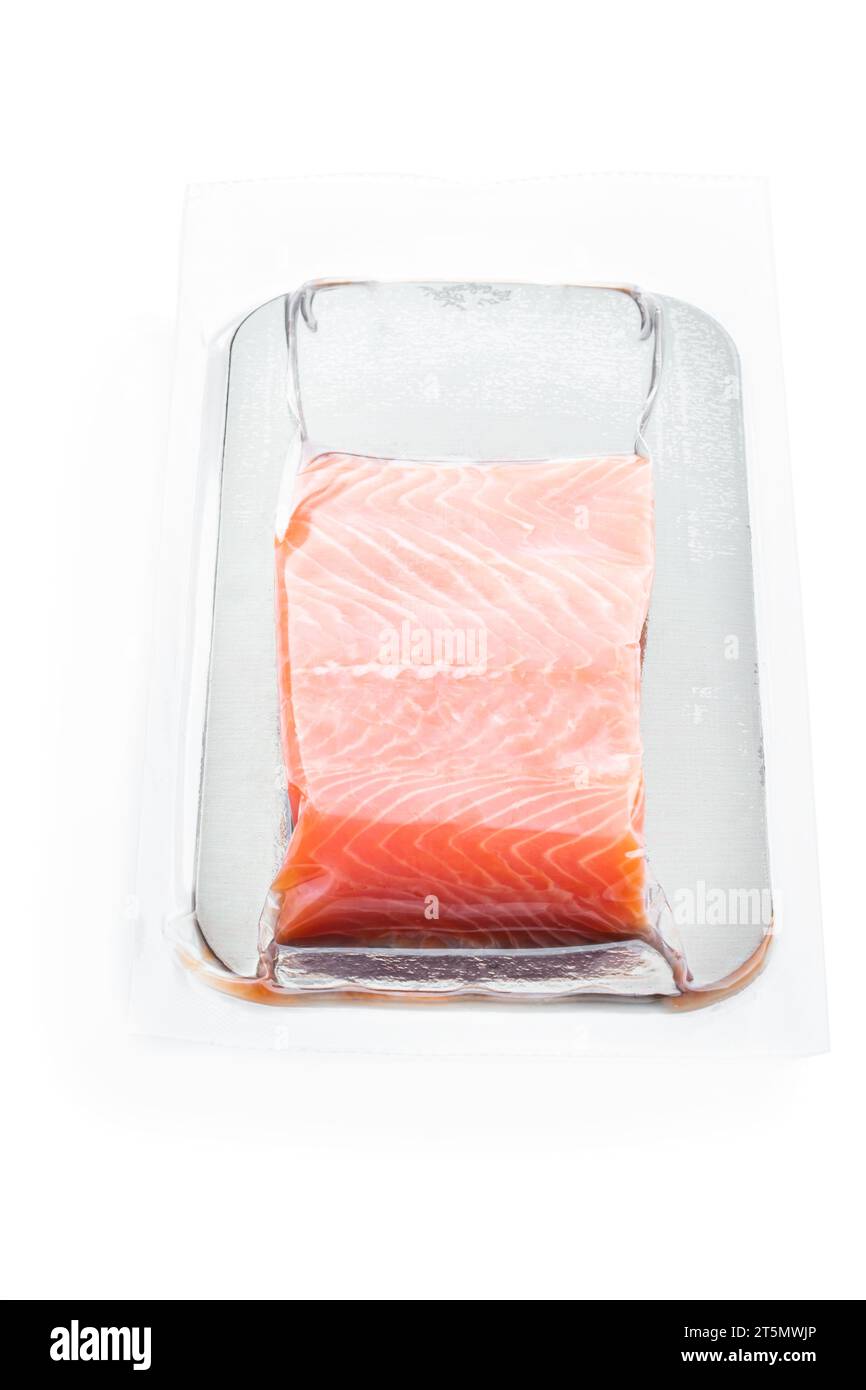 Vacuum packed salmon portion fillet isolated on white background Stock