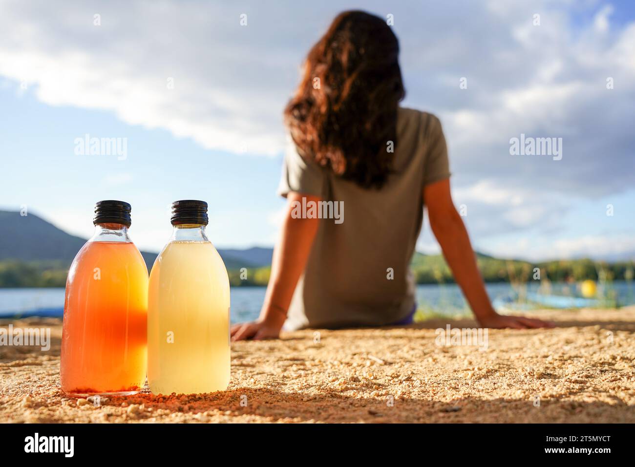 bottle of refreshing and probiotic drink. Kombucha with lemon, liquid medicine with vitamins Stock Photo