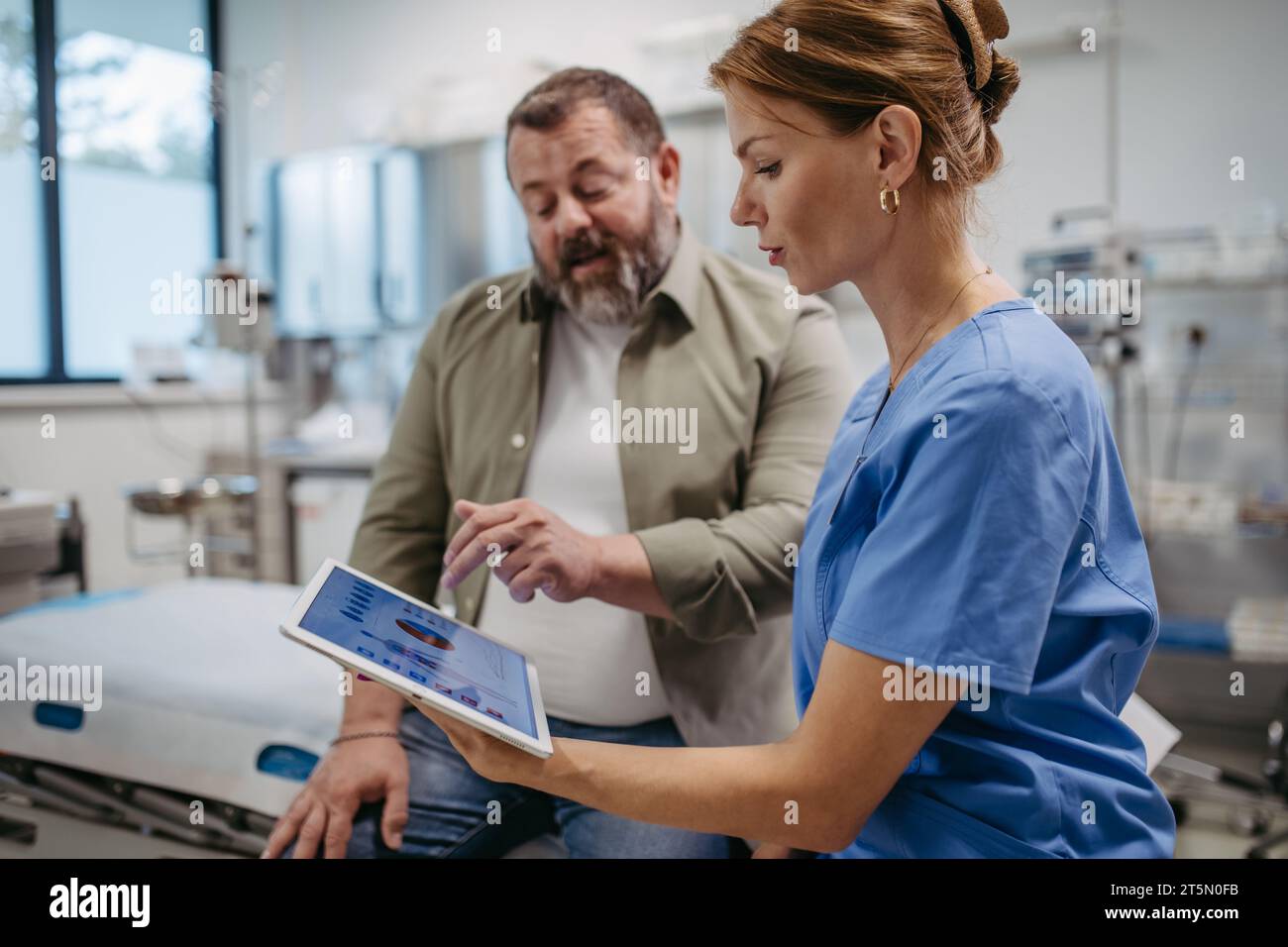 Female doctor consulting with overweight patient, discussing test