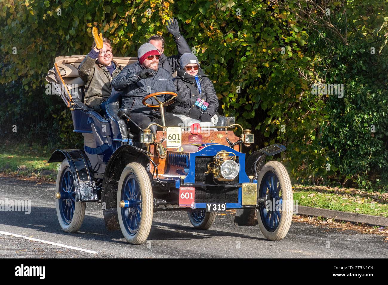 5th November 2023. Participants in the London to Brighton Veteran Car Run 2023 driving through West Sussex, England, UK. The route of the popular annual event is about 60 miles long. A 1905 Cadillac on the road. Stock Photo