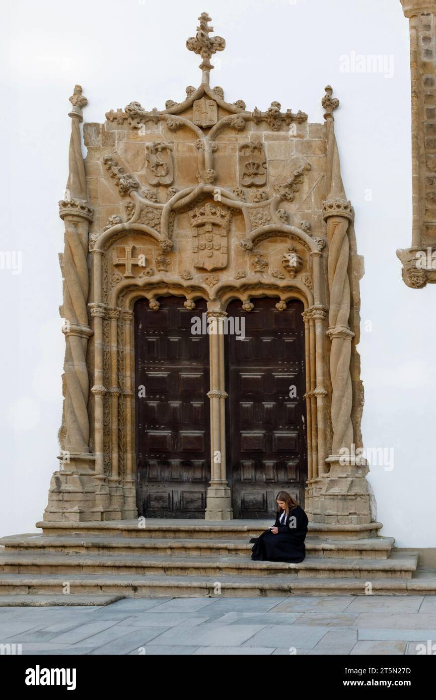 COIMBRA, PORTUGAL - November 12, 2021: View on the courtyard of the oldest university with students in black uniform in Coimbra city in the central Po Stock Photo