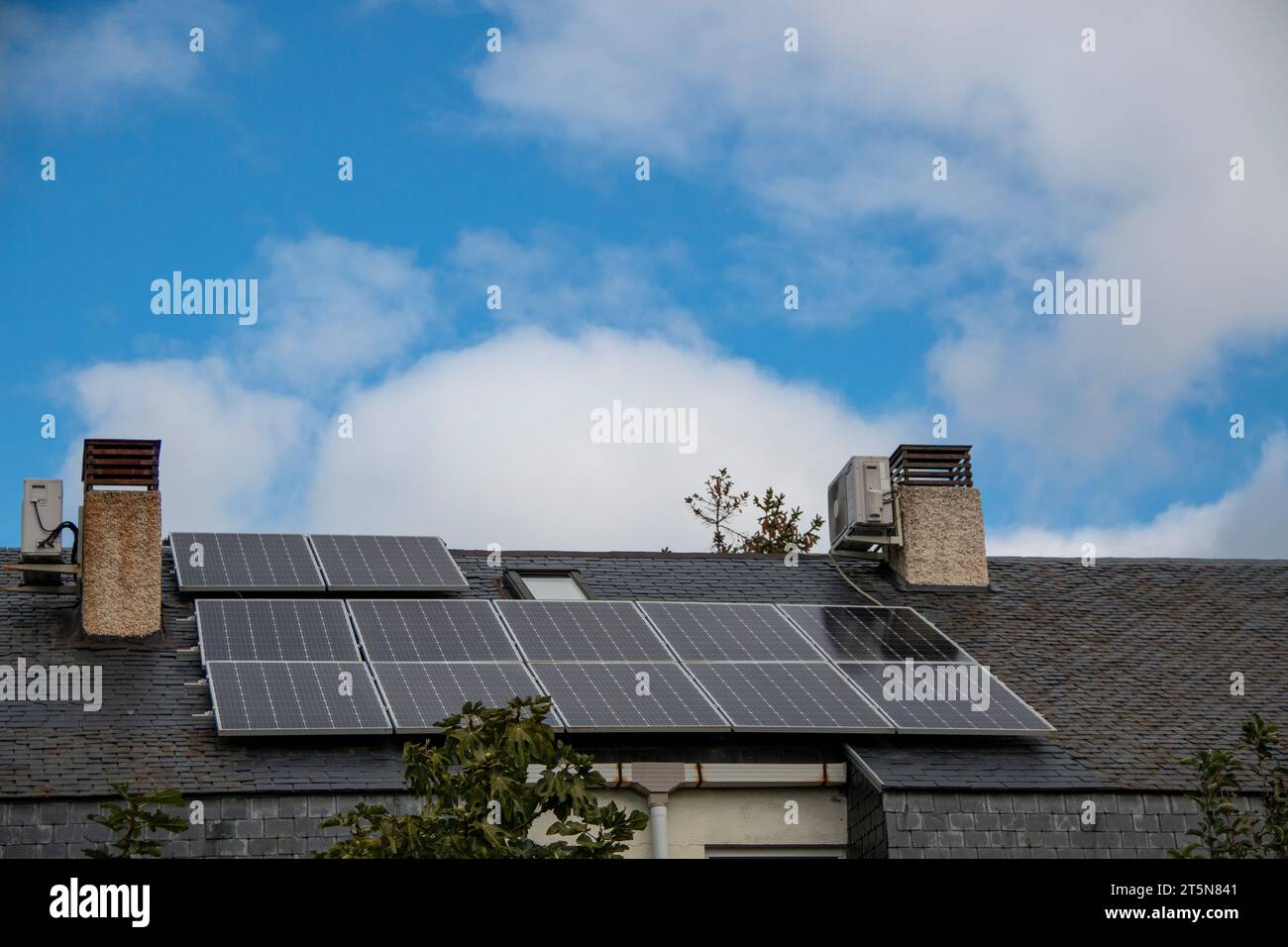 Photovoltaic solar panels installed on a slate roof Stock Photo Alamy