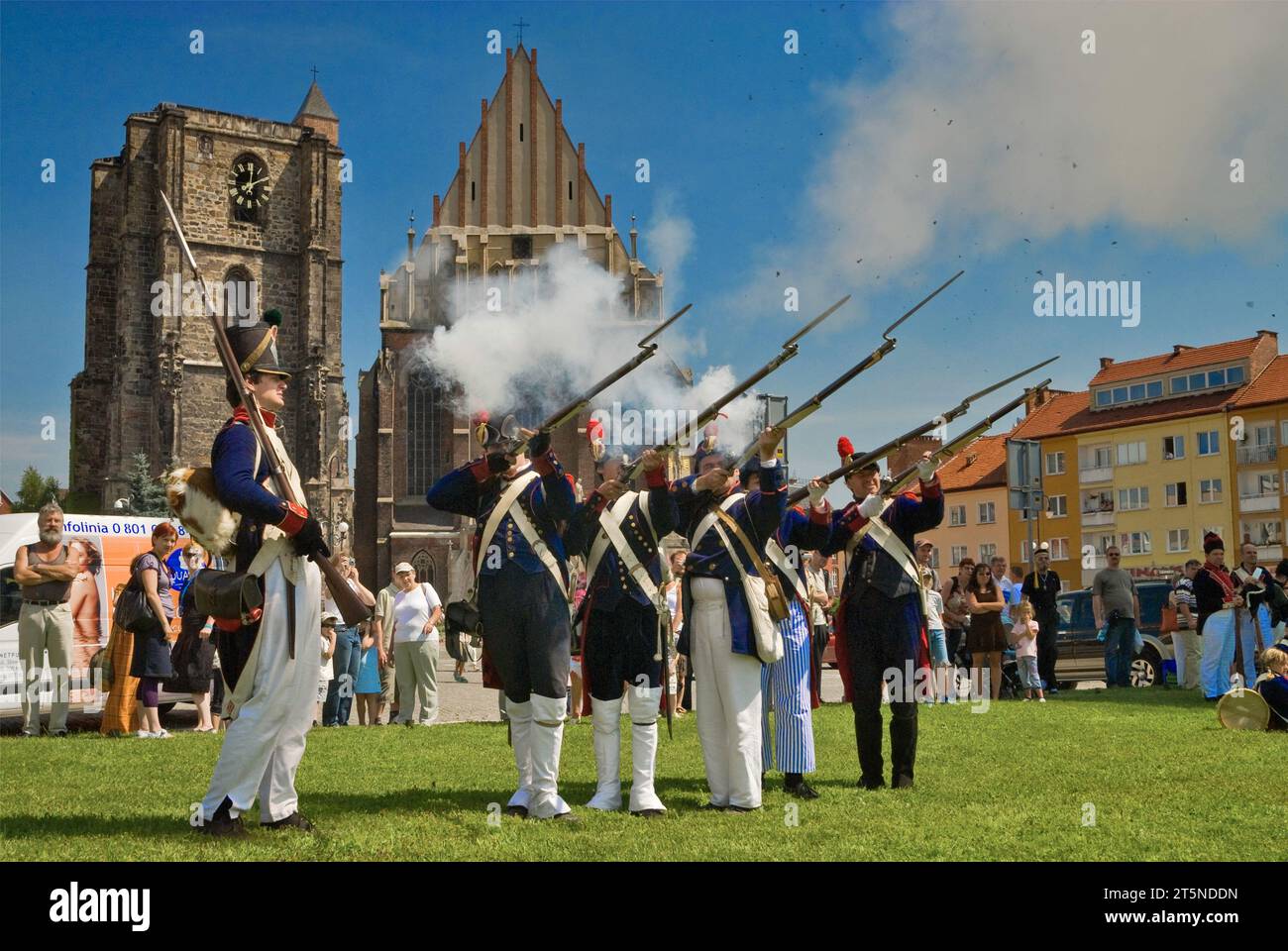 Reenactors in historic uniforms firing muskets before Reenactment of Siege of Neisse during Napoleonic War with Prussia in 1807, in Nysa, Poland Stock Photo