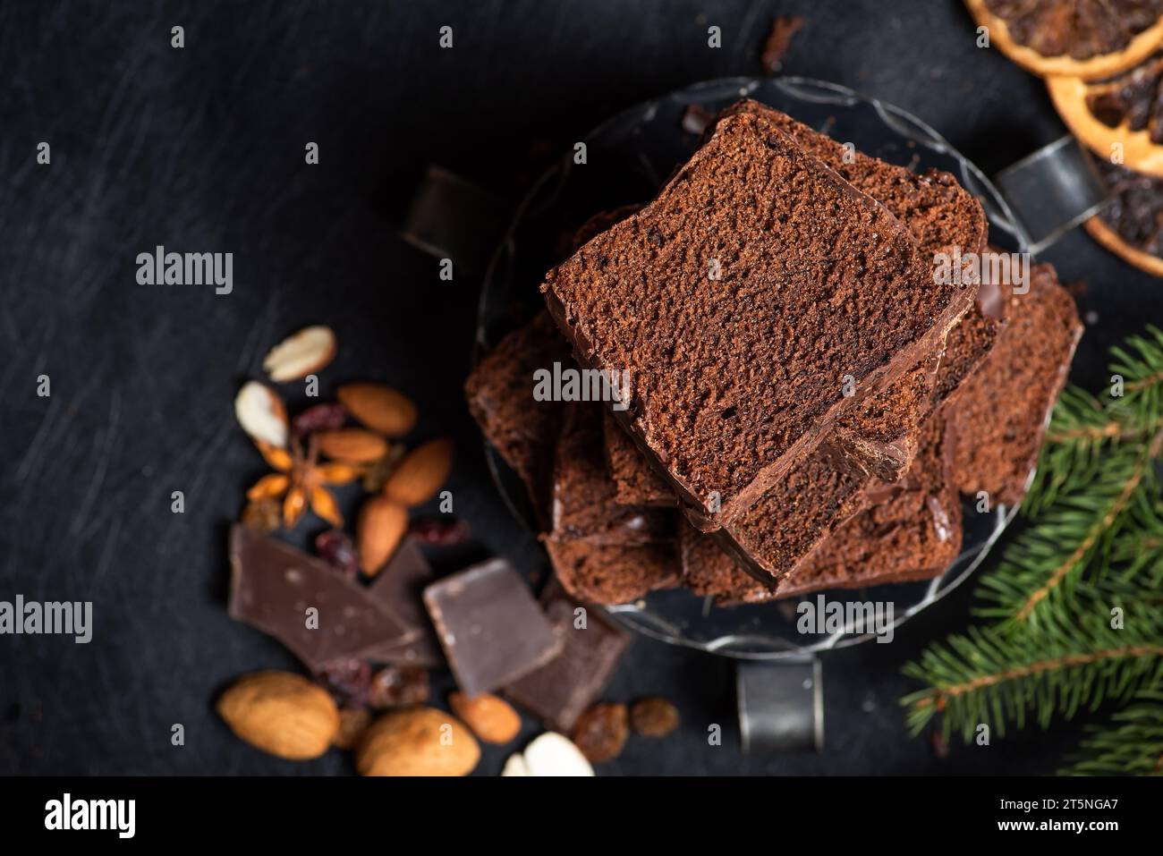 Pile of chocolate cake pieces on a plate. Homemade delicious, soft, dark chocolate sweet Stock Photo