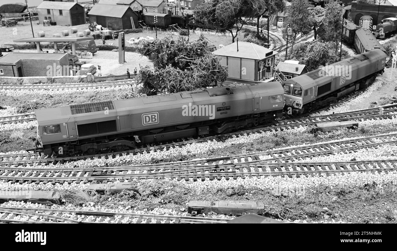 Class 66 locomotives double heading a pullman car passenger train stock