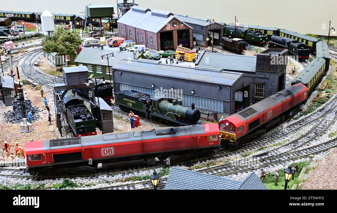 Class 66 locomotives double heading a pullman car passenger train stock