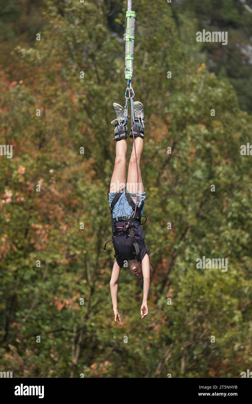 Bungee jumping young woman Stock Photo