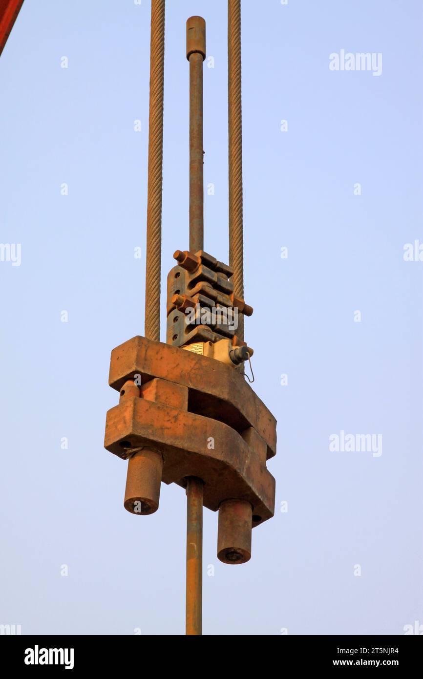 Crank balanced beam pumping unit beam hanger, closeup of photo Stock Photo