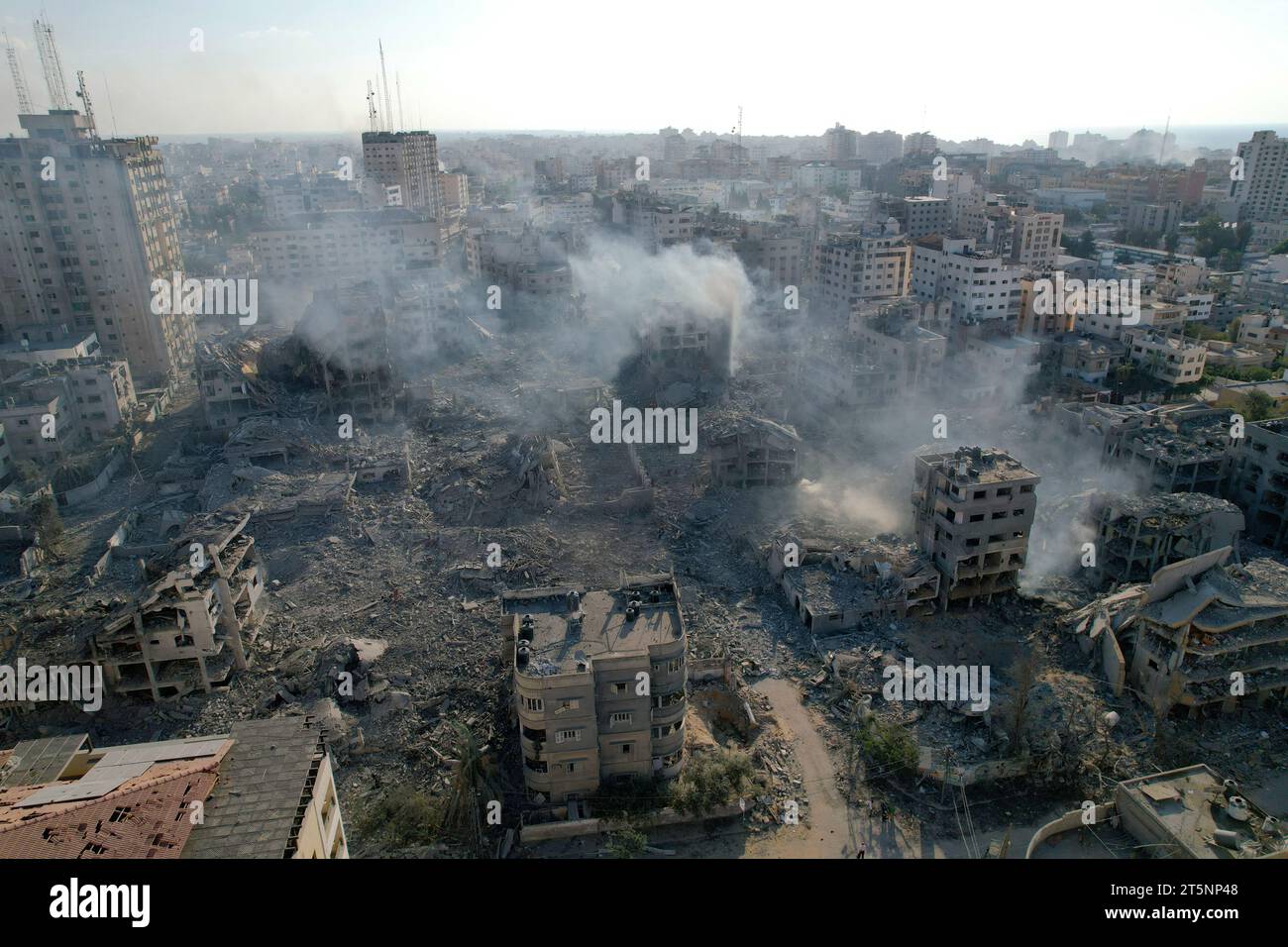 GAZA CITY, PALESTINE - 10 October 2023 - Widespread damage to buildings near the Palestine Tower in Gaza City after bombardment by Isreali forces, as Stock Photo