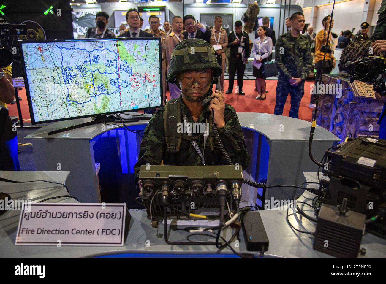 Thai army personnel seen demonstrating an army operation machine  during the exhibition. The Defense and Security 2023 was held at the IMPACT Muang Thong Thani, Nonthaburi province, the four-day exhibition that showcase of the new military weapons, equipment, technology and products for land, sea and air defense, and internal security. (Photo by Peerapon Boonyakiat / SOPA Images/Sipa USA) Stock Photo