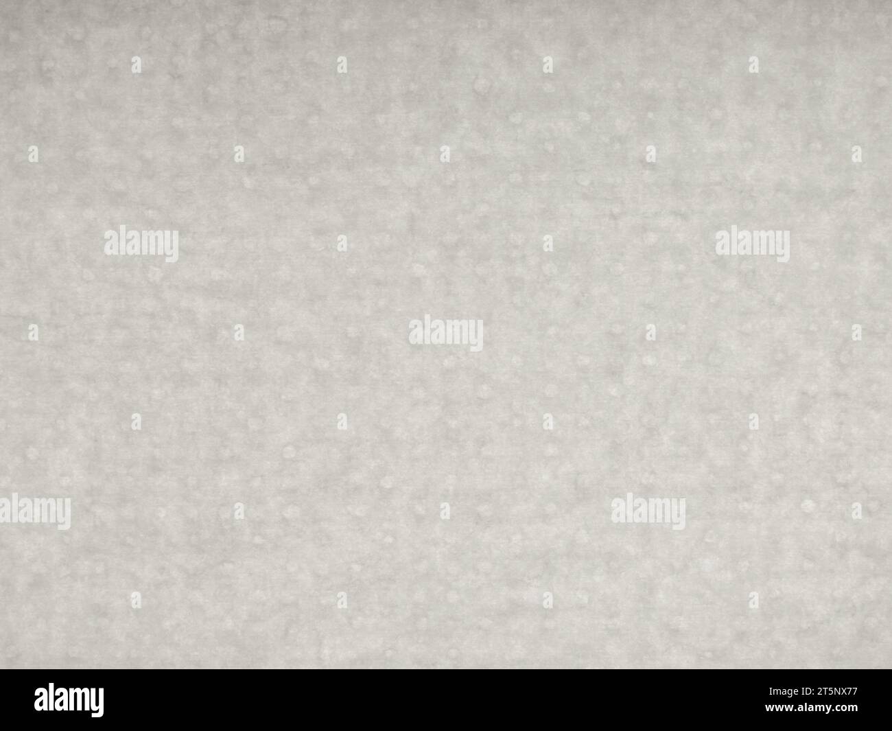 Packing gray spotted paper sheet. Subtle texture. Low contrast pattern. Stock Photo