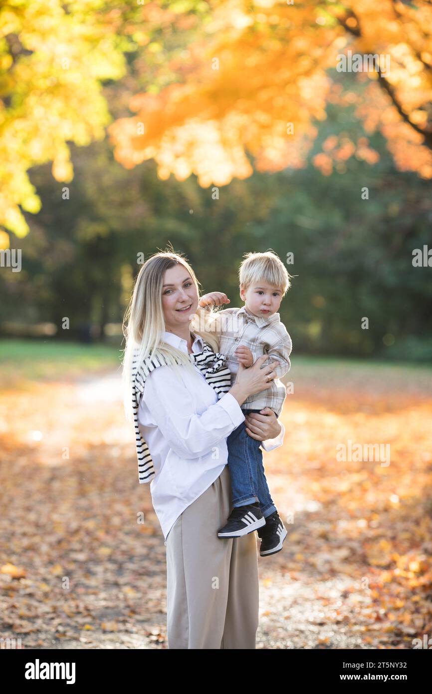 Mothers day, love family. Family on autumn walk in nature outdoors ...