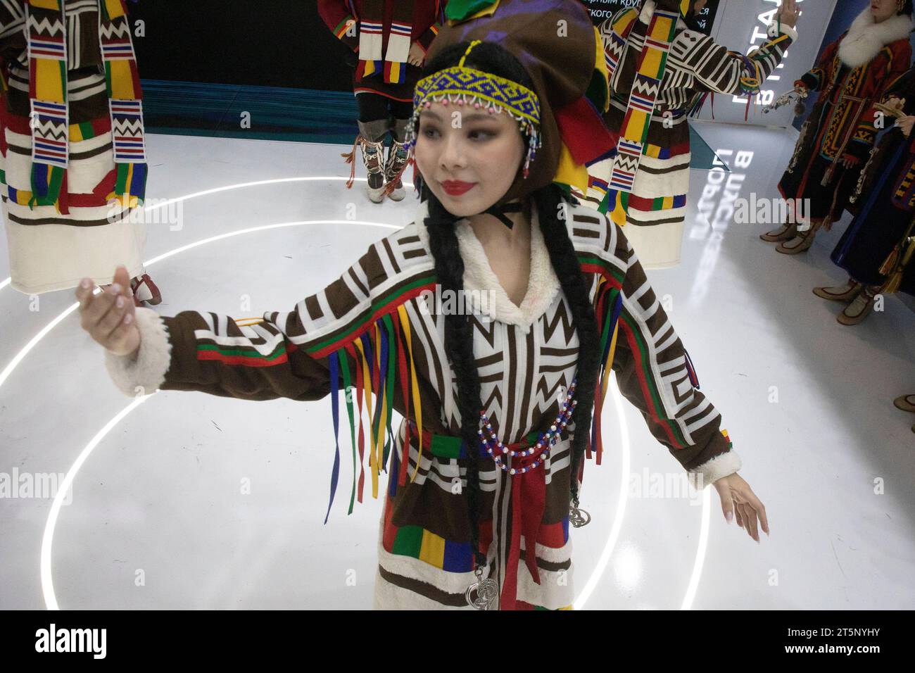 Moscow, Russia. 4th of November, 2023. Artists in national costumes perform at the stand of the Yamalo-Nenets Autonomous Okrug during the Russia Expo international exhibition and forum at the VDNKh exhibition centre in Moscow, Russia. Stock Photo