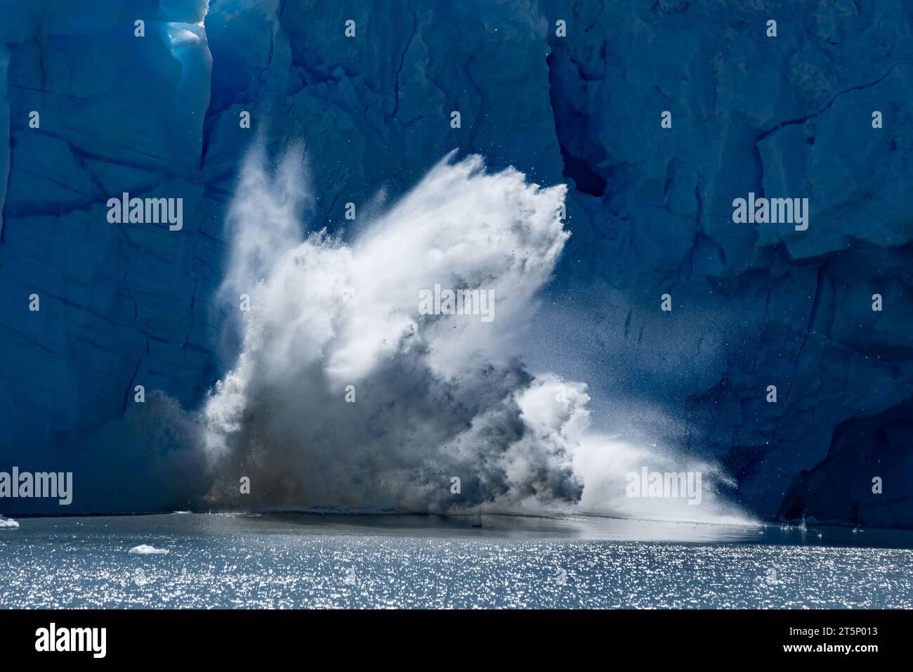 A big ice chunk falls from Perito Moreno Glacier, in Argentina Stock Photo