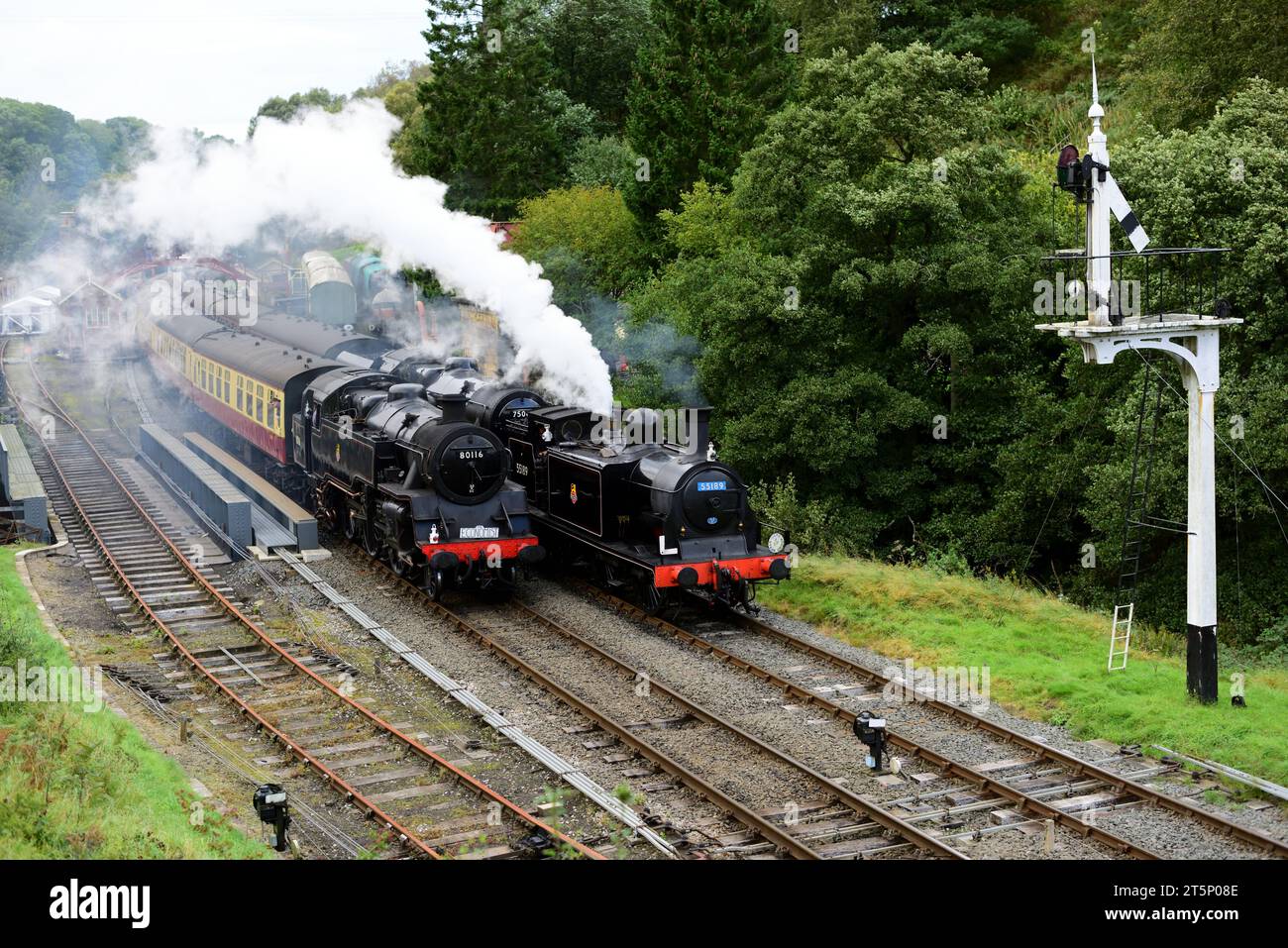 Steam train action at Goathland station on the North Yorkshire Moors Railway during its 50th Anniversary gala. Stock Photo