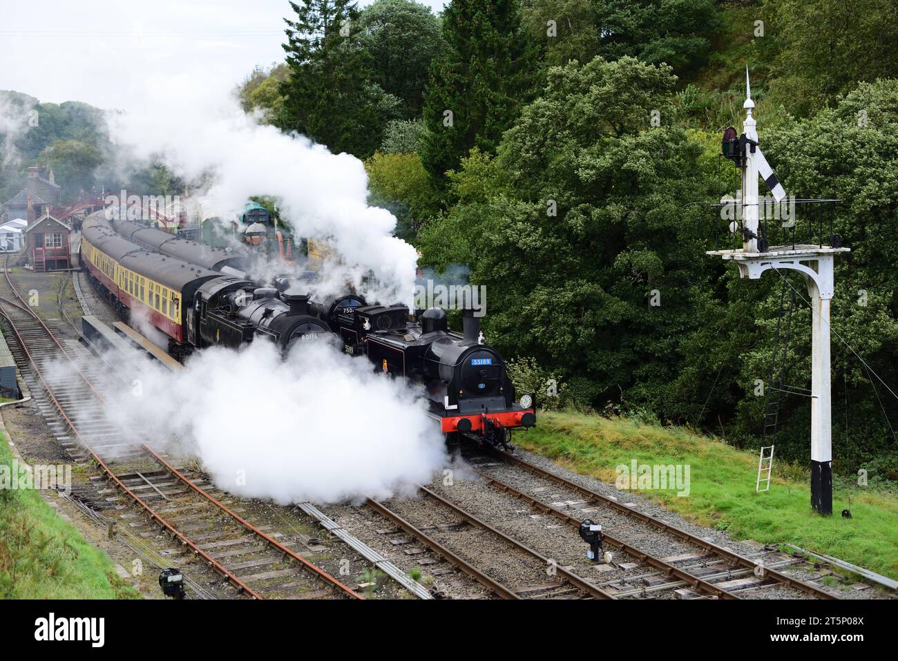 Steam train action at Goathland station on the North Yorkshire Moors Railway during its 50th Anniversary gala. Stock Photo