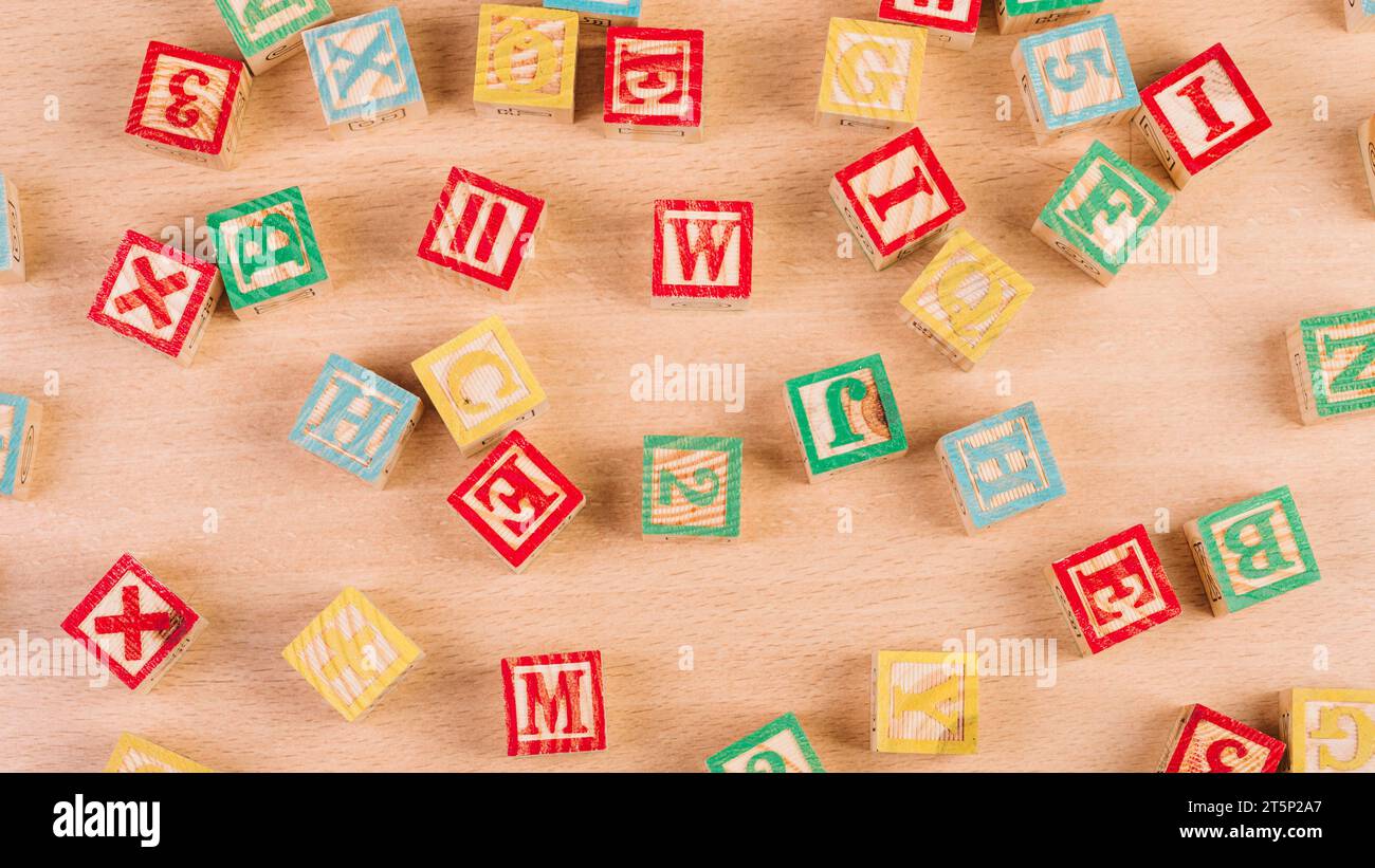 Wooden bright cubes scattered floor Stock Photo