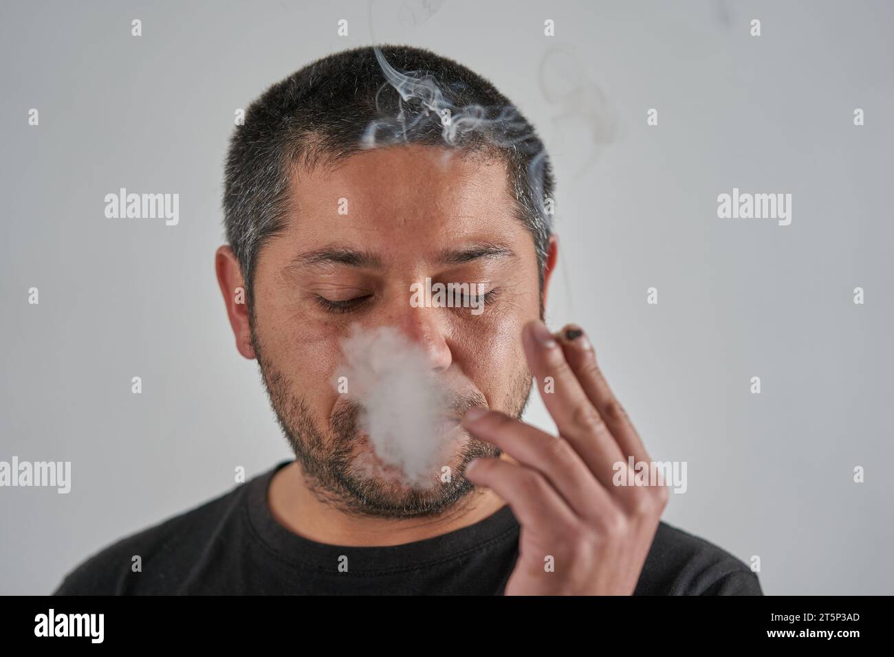 Male Smoking with White Isolated Background Stock Photo