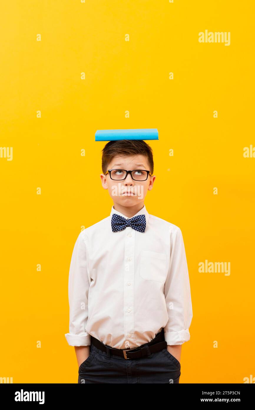 Copy space boy with book head Stock Photo - Alamy