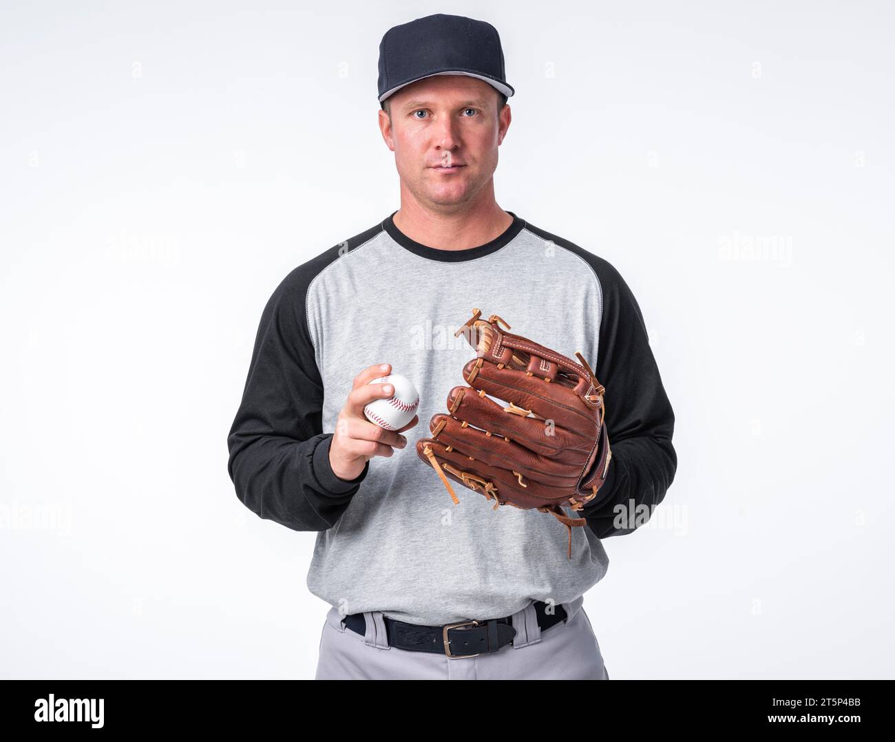 Front view man posing with baseball glove Stock Photo