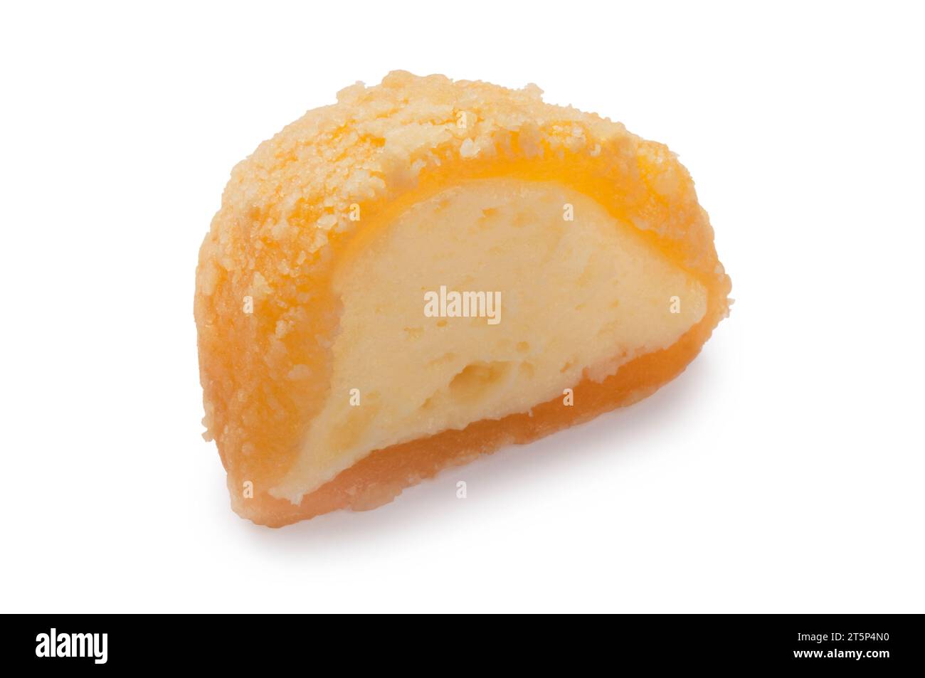 Studio shot of small mango cheesecake mochi cut out against a white background - John Gollop Stock Photo