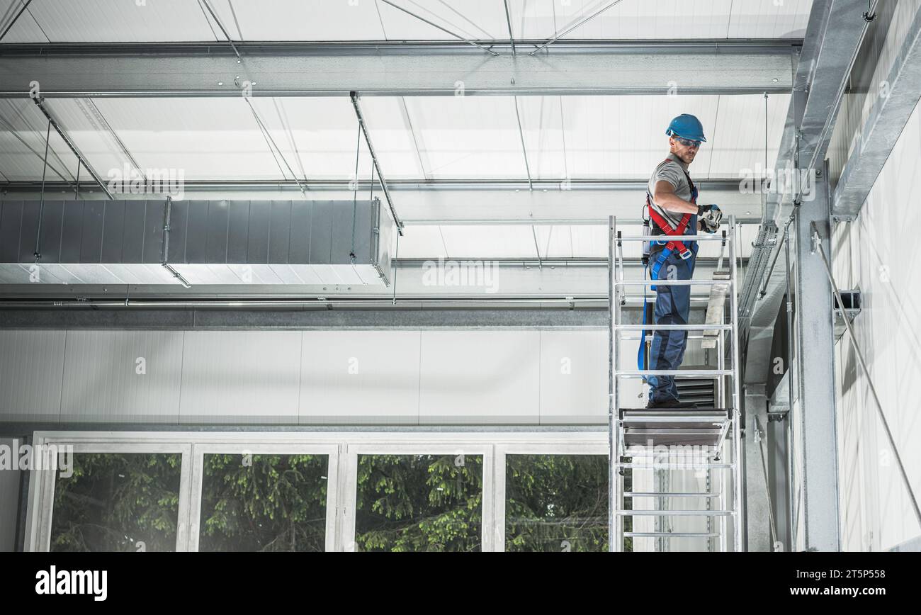 HVAC Air Heating and Cooling Technician Assembling Air Duct Elements