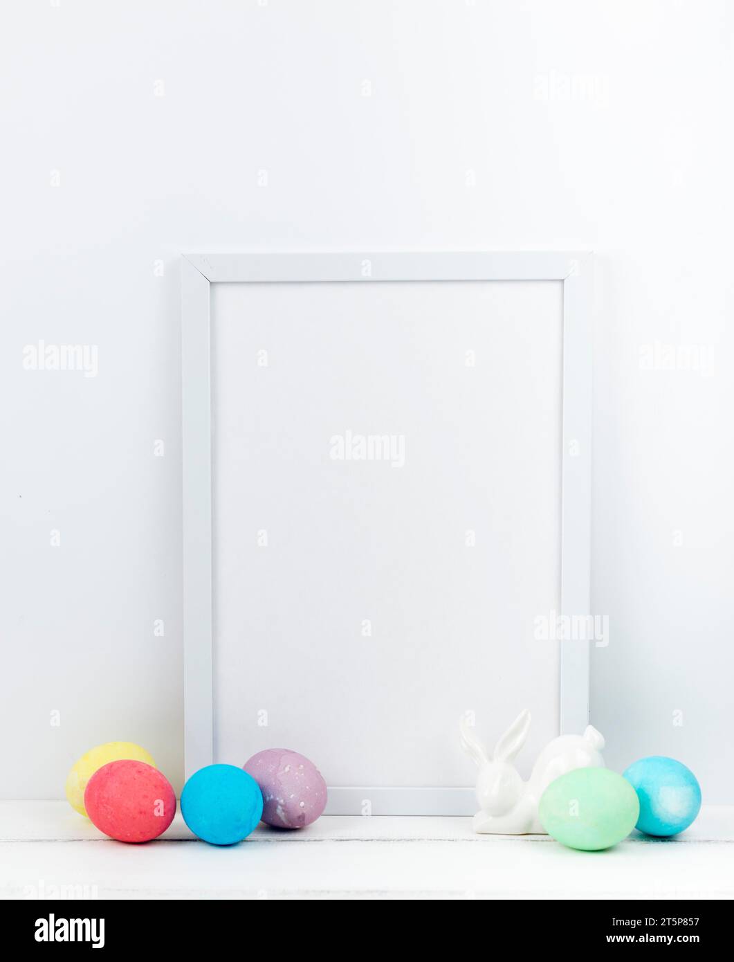 Easter eggs with blank frame table Stock Photo