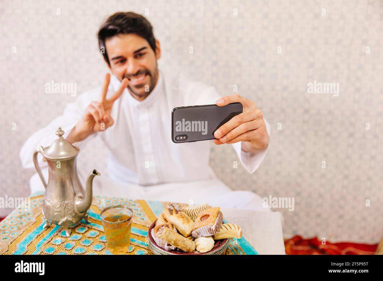 Muslim man taking selfie Stock Photo