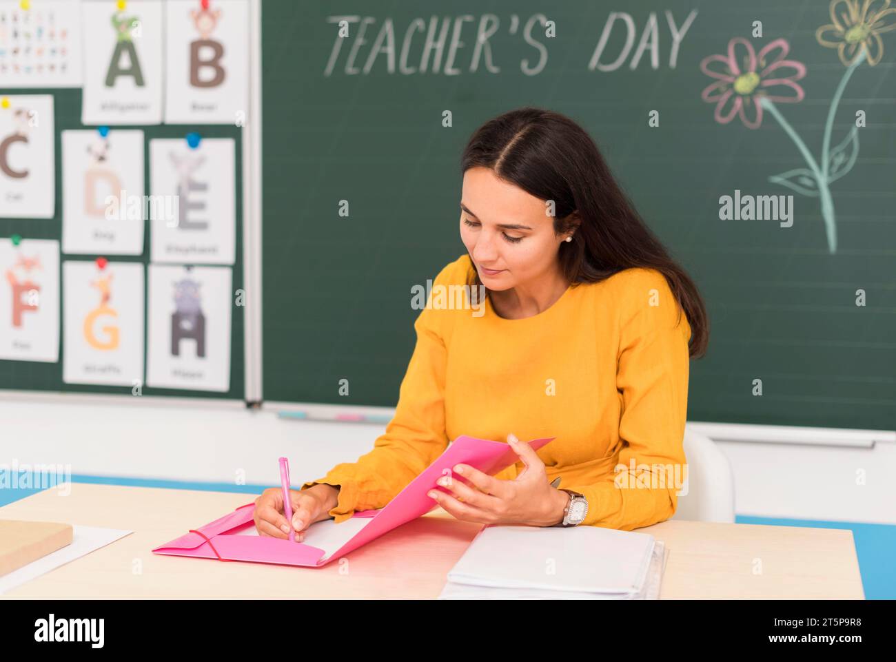 Teacher Taking Notes Class Stock Photo Alamy Teacher Taking Notes Class Stock Photo Alamy