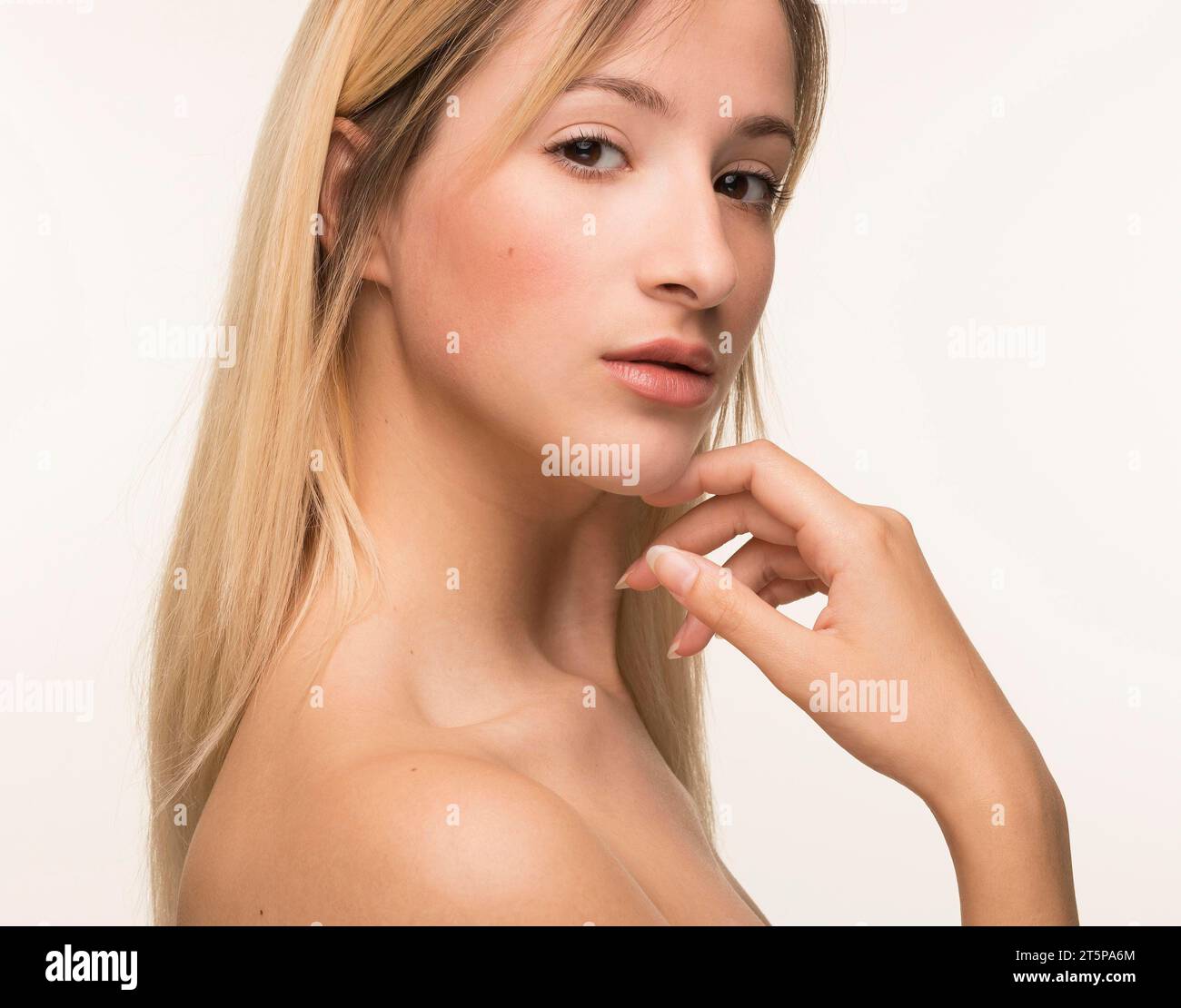 Young woman hand chin pose Stock Photo