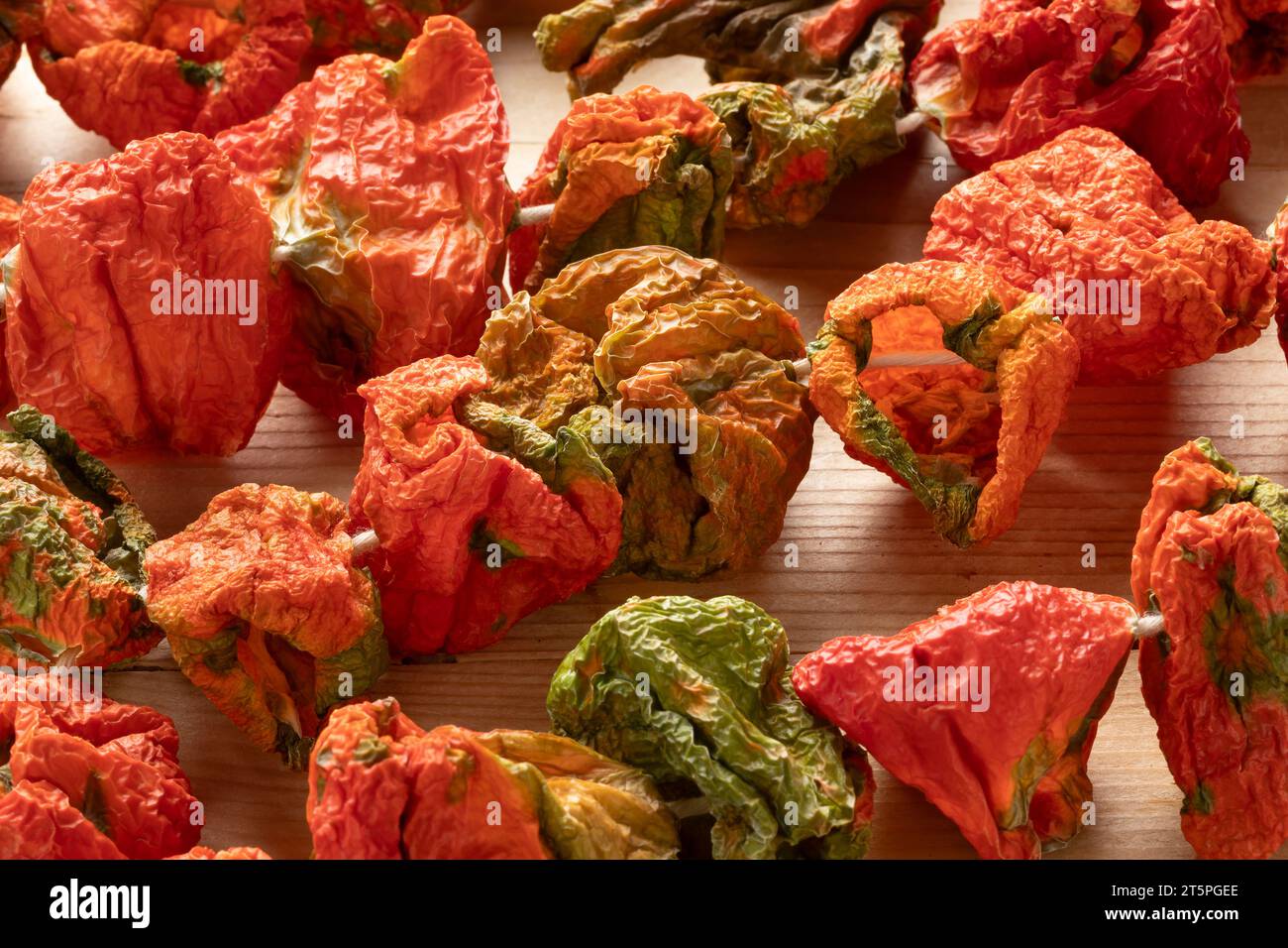 Chain of Turkish sun dried red and green peppers, Biber Kurusu,  close up Stock Photo