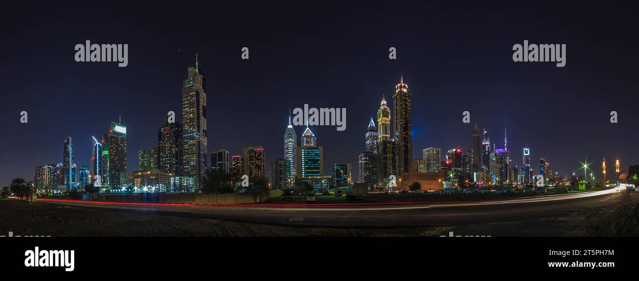 Panoramic view of the Dubai skyline at night photographed in November 2016 Stock Photo