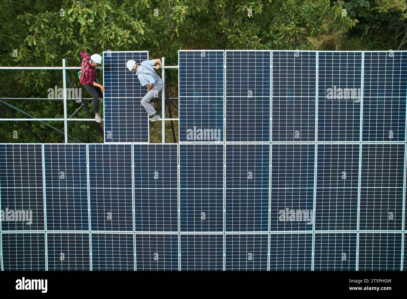 Engineers installing solar panel hi-res stock photography and images ...