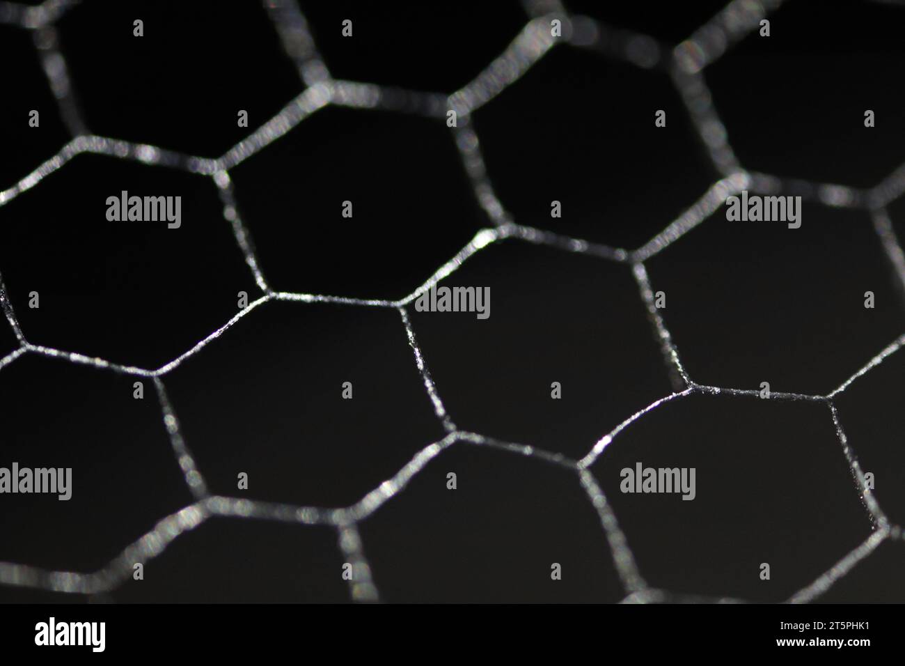 Honeycomb metal pattern. Black texture. Stock Photo
