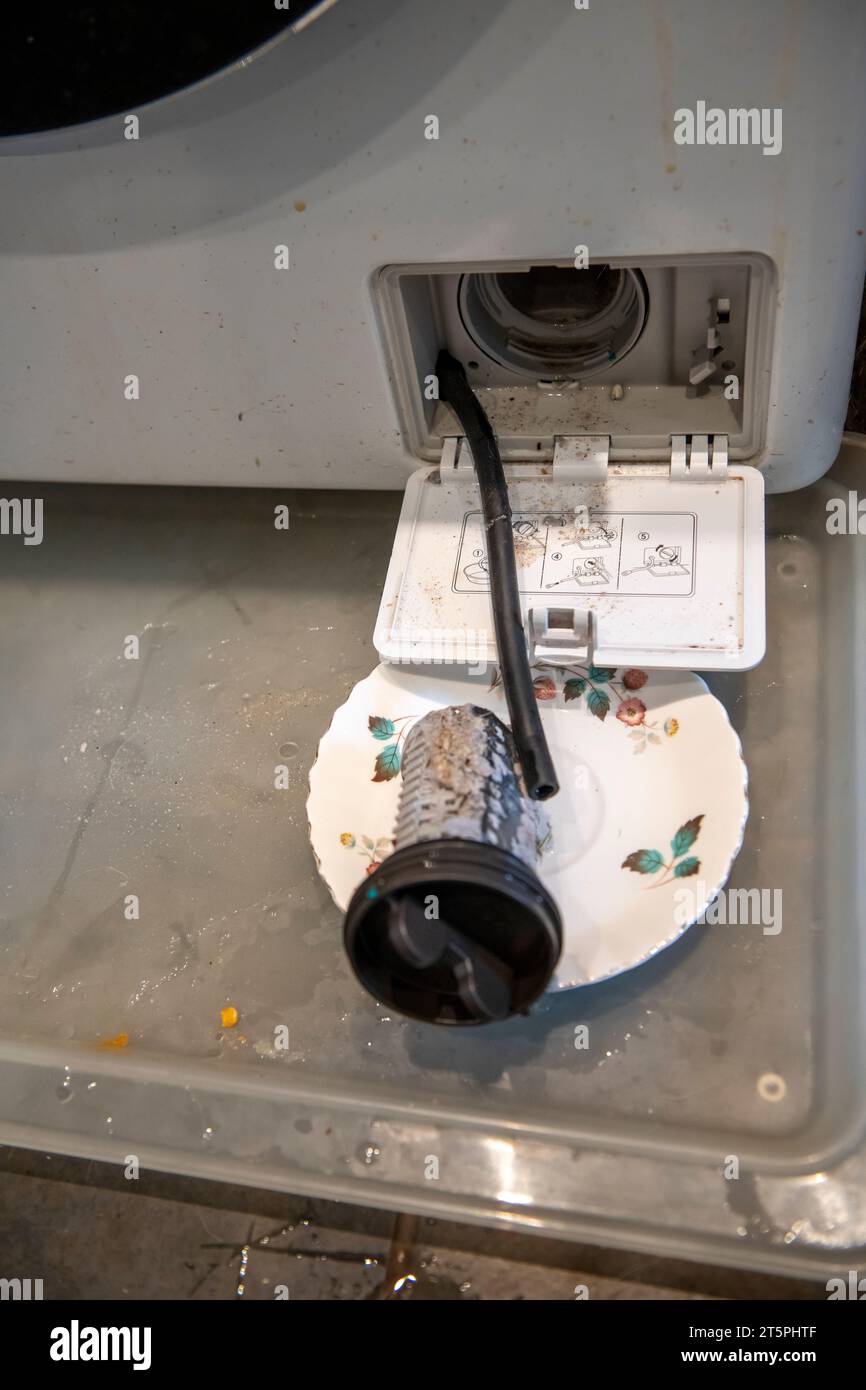 Washing machine water filter clogged hires stock photography and images Alamy