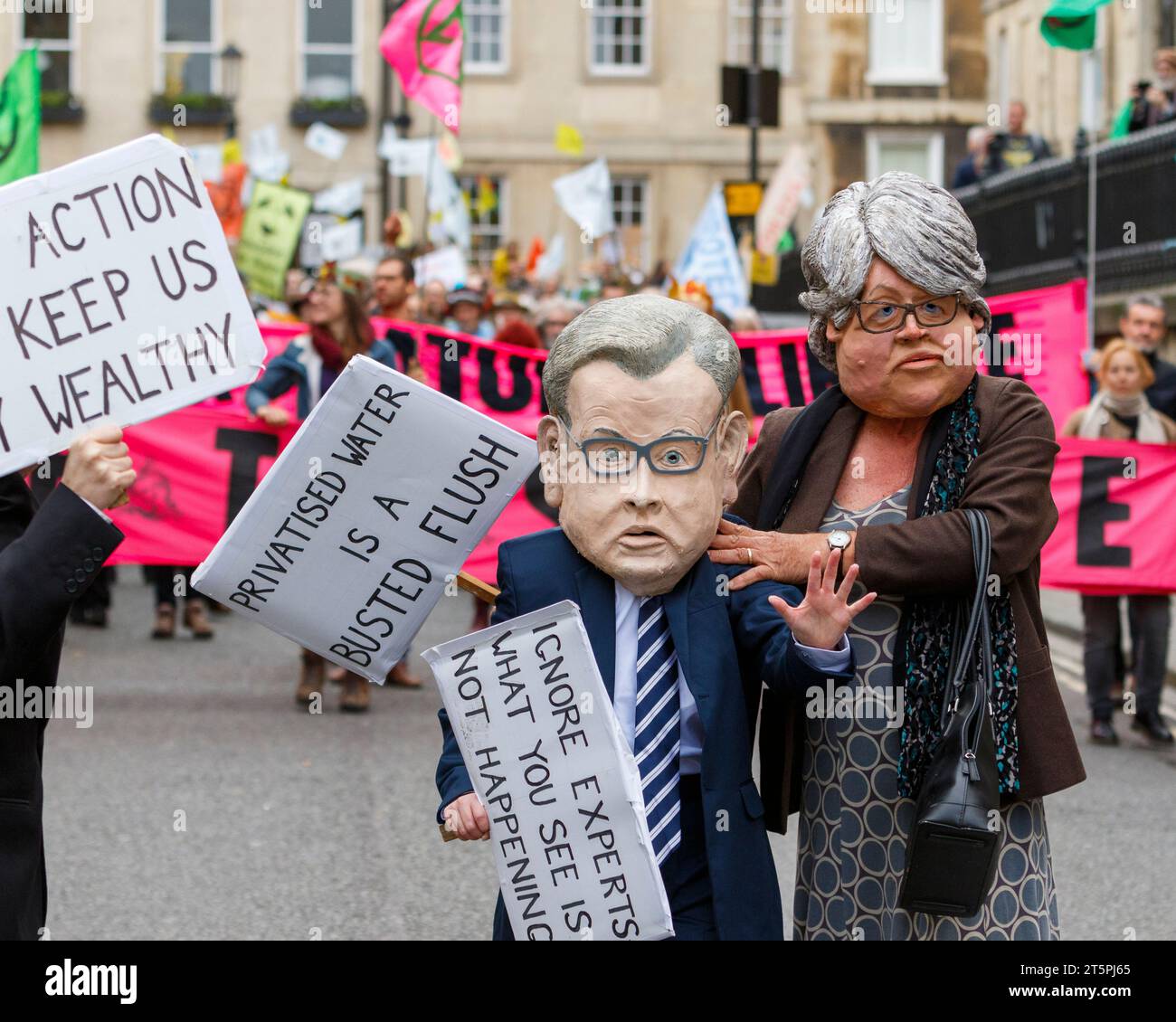 Bath, UK. 28th Oct, 2023. Climate-change campaigners protesters are pictured as they take part in a protest march through Bath city centre. Stock Photo