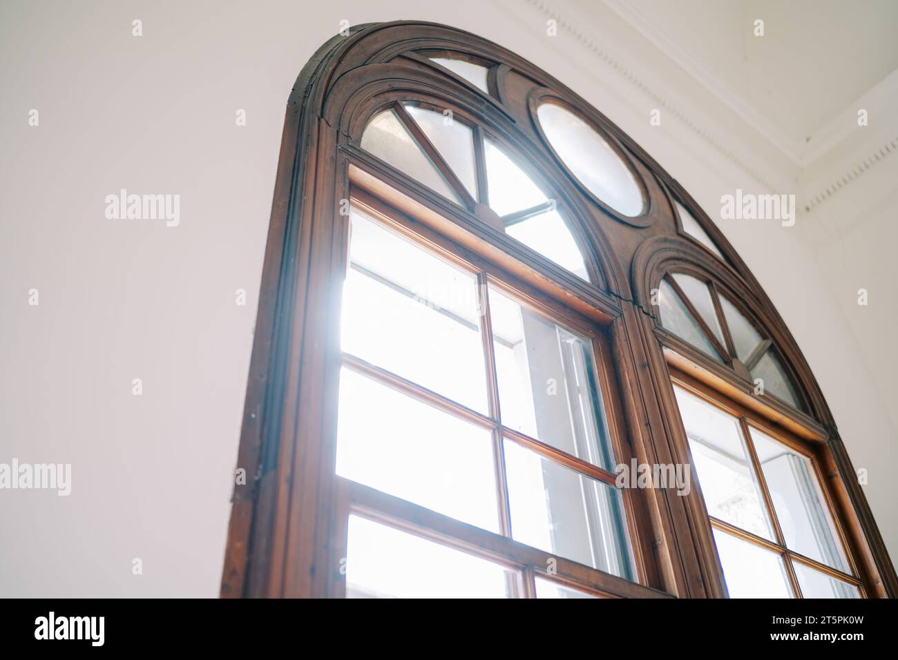 Arched wooden window in a room of an ancient villa Stock Photo - Alamy