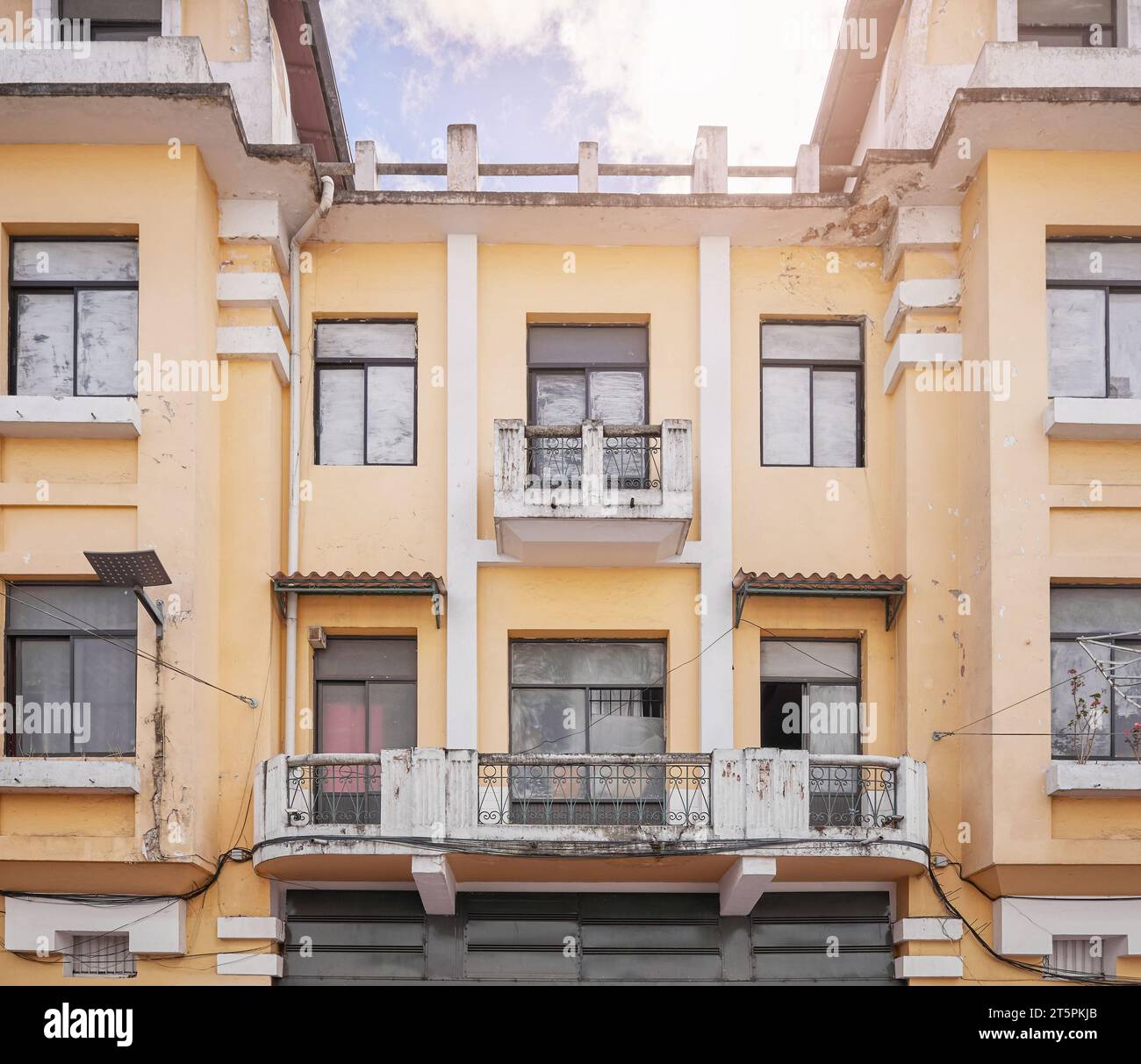 Street view of an old building facade in Quito, Ecuador. Stock Photo