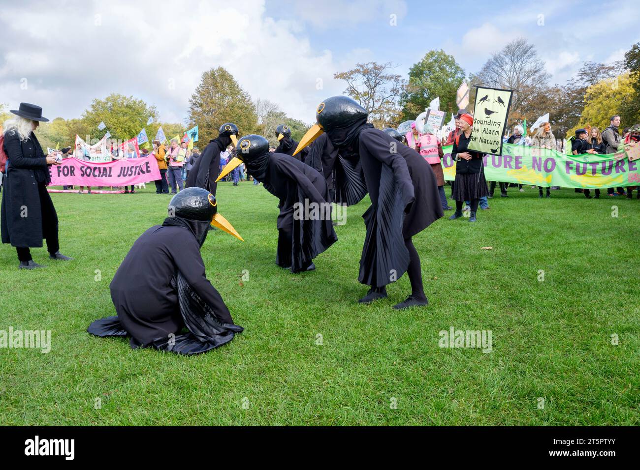 Bath, UK. 28th Oct, 2023. Climate-change campaigners protesters are pictured as they take part in a protest march through Bath city centre. Stock Photo