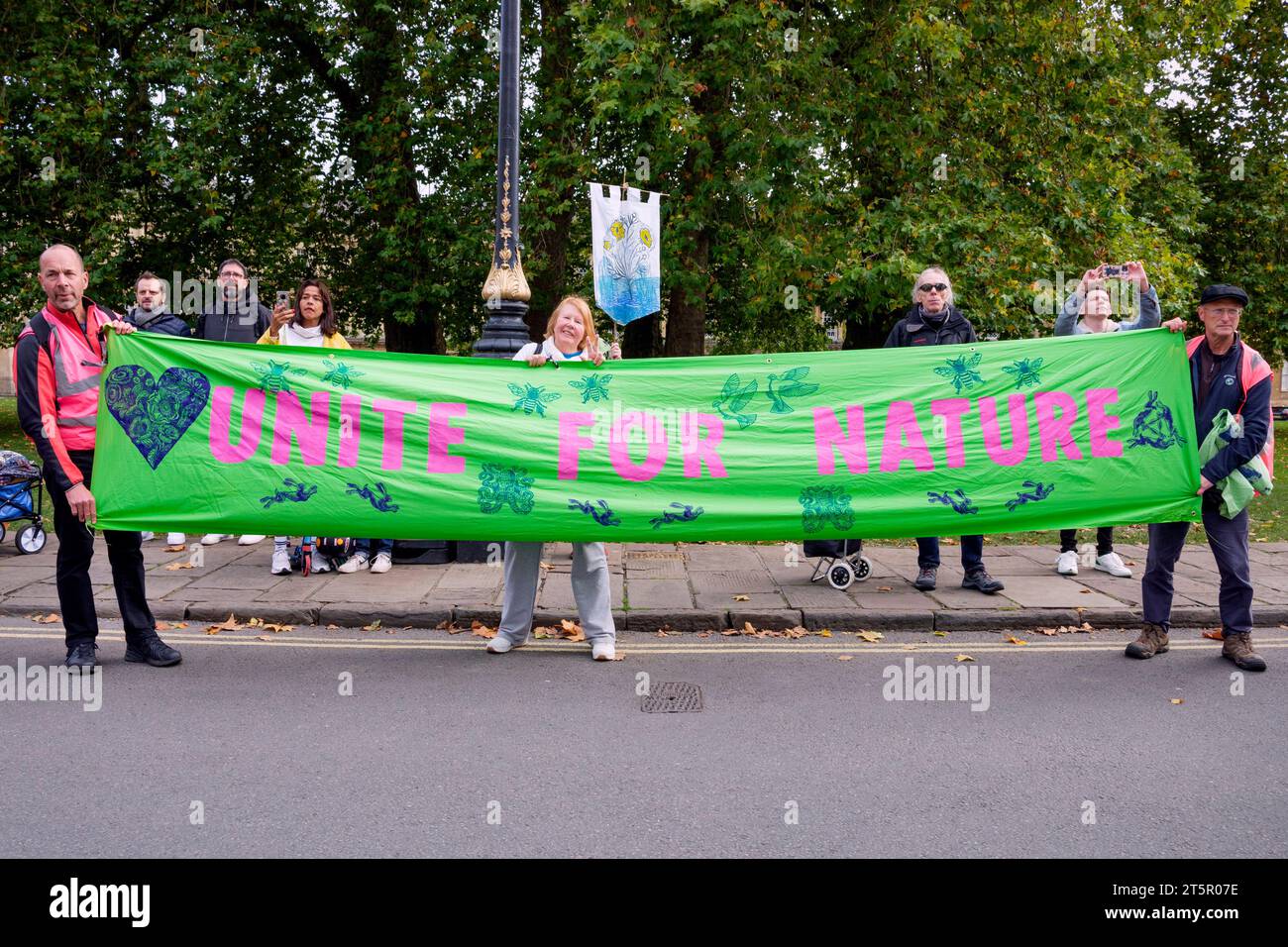 Bath, UK. 28th Oct, 2023. Climate-change campaigners protesters are pictured as they take part in a protest march through Bath city centre. Stock Photo