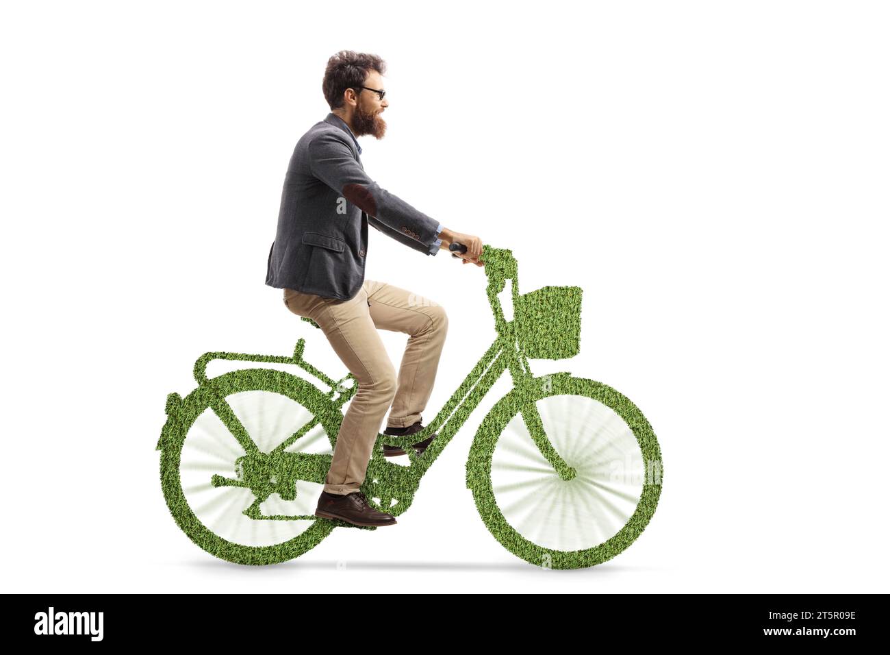 Bearded man riding a bike made of green grass isolated on white background Stock Photo