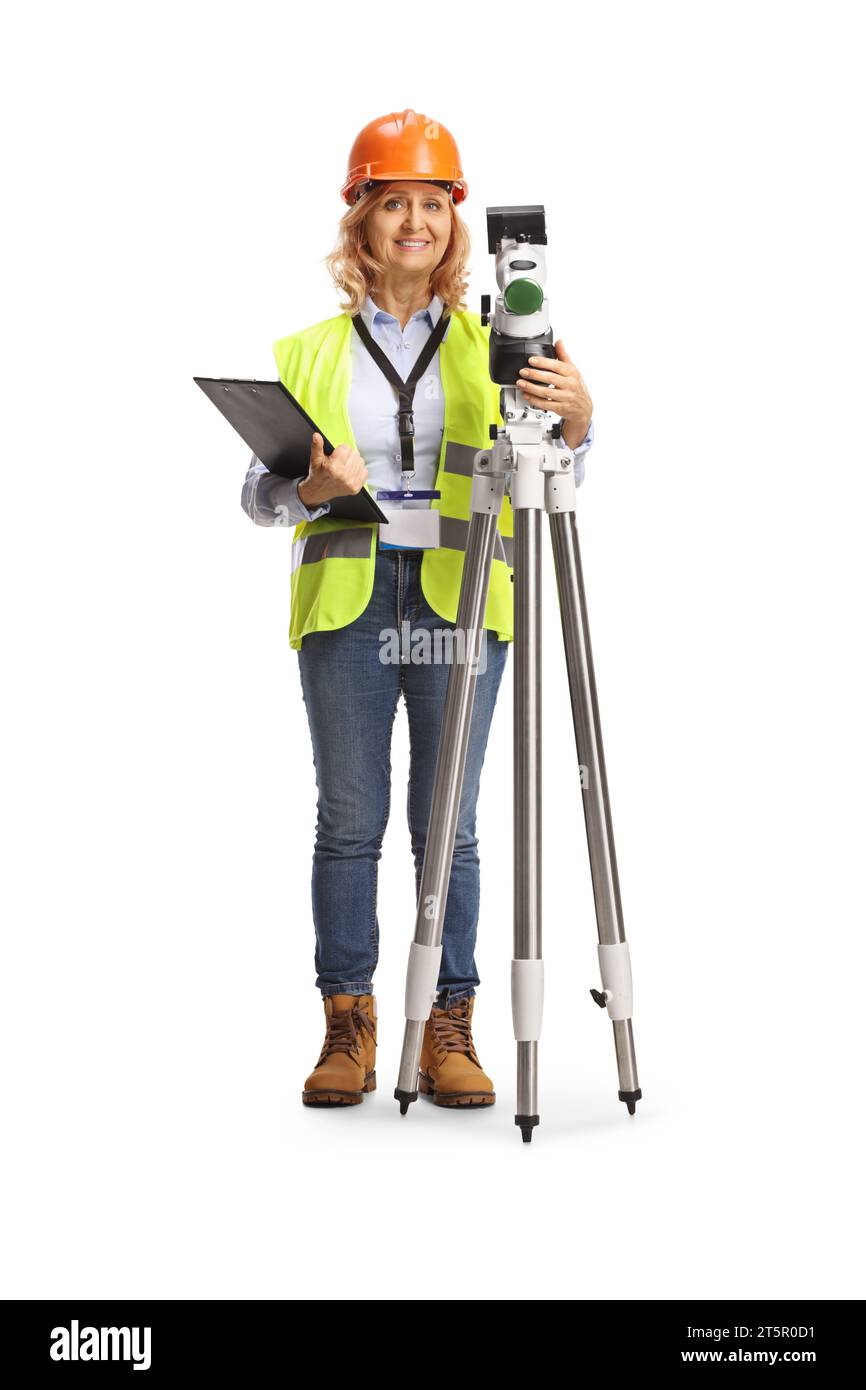 Full length portrait of a woman geodetic surveyor posing with a measuring station isolated on white background Stock Photo