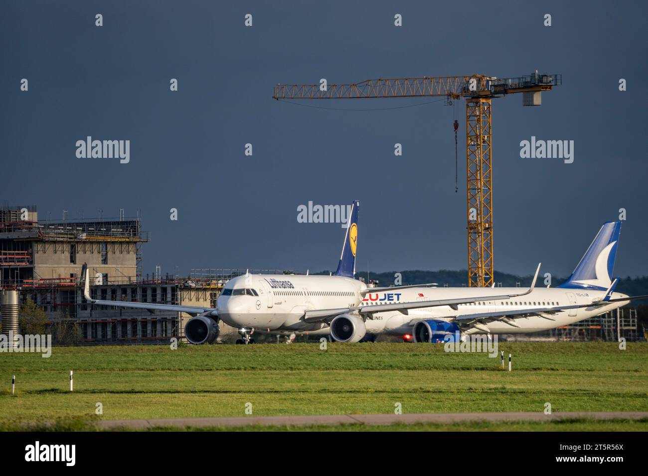 Lufthansa Airbus on the taxiway for take-off at Düsseldorf International Airport, Anadolujet, Stock Photo
