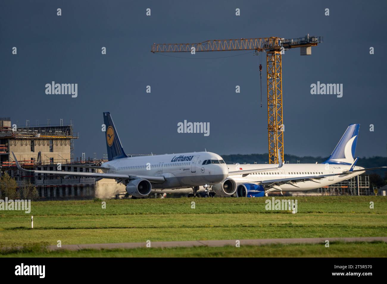 Lufthansa Airbus on the taxiway for take-off at Düsseldorf International Airport, Anadolujet, Stock Photo